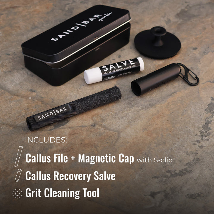 Quickie callus care kit including file, magnetic cap, S-clip, salve, silicone scrubber, and tin case