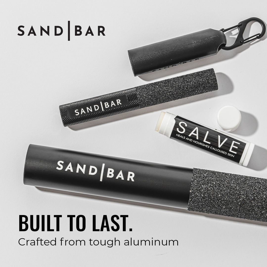 Group of products showing an 8-inch SandBar Original Callus File in black, Salve, and a 4-inch SandBar Quickie Callus File in black