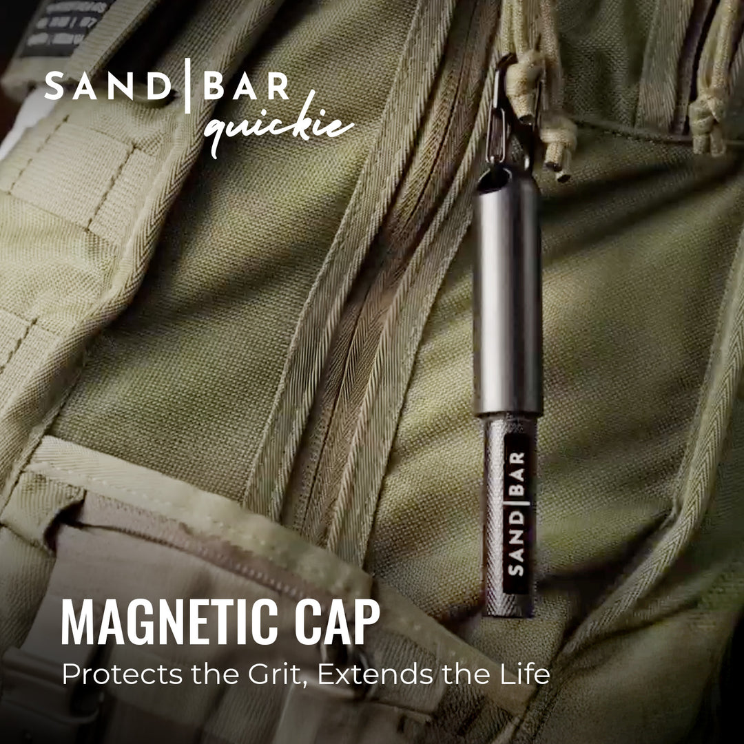 Green bag with SandBar Quickie callus file attached to the bag using the magnetic cap with hook