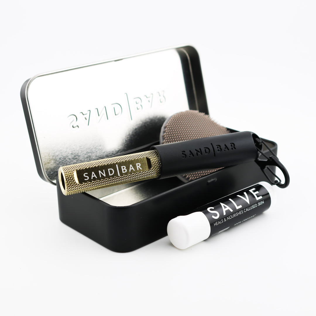 SandBar 4-inch Quickie Callus Kit with cylindrical aluminum file, salve, scrubber, and tin case