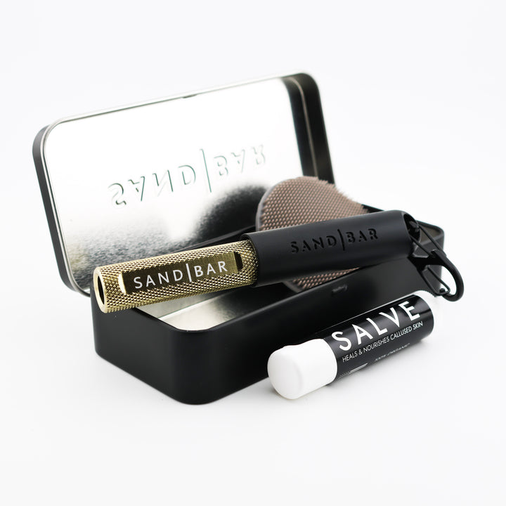 SandBar 4-inch Quickie Callus Kit with cylindrical aluminum file, salve, scrubber, and tin case