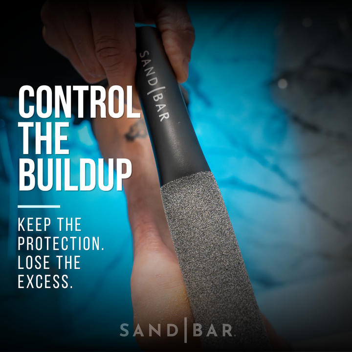 Person using SandBar foot file on heel to remove excess callus buildup.