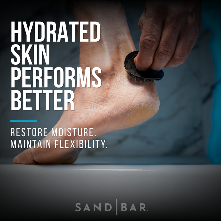 Person applying Heel Polish to heel with silicone applicator for moisture and skin flexibility.