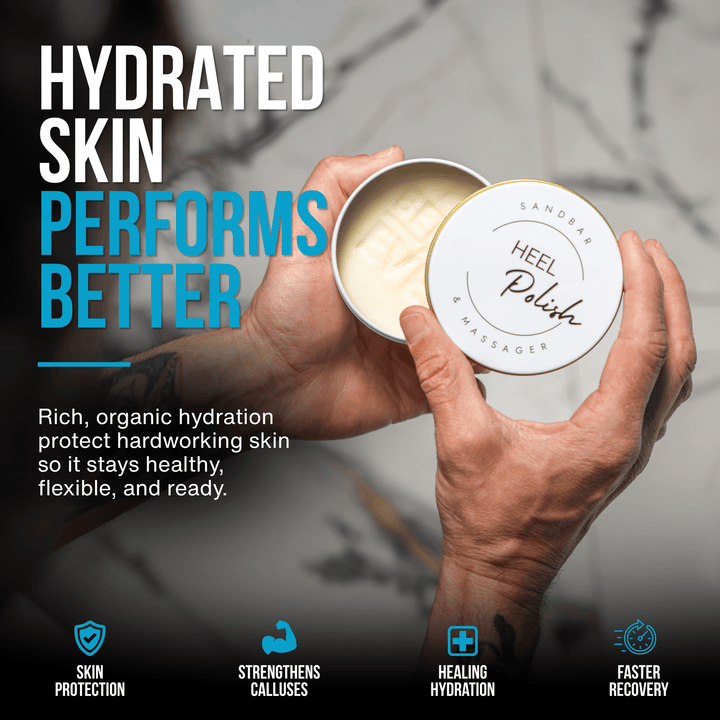 Athlete holding tin of SandBar Heel Polish to deeply hydrate and protect dry, hardworking feet after training.