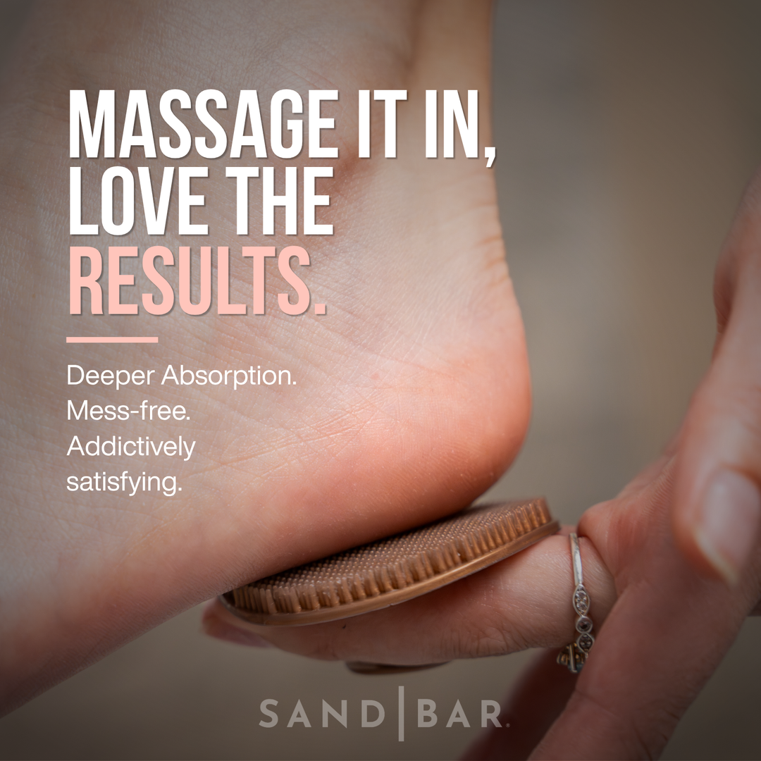 Close-up of Heel Polish massage applicator being used on heel for deeper absorption and lasting hydration.