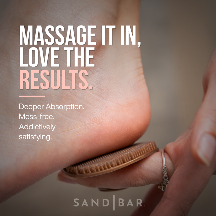 Close-up of Heel Polish massage applicator being used on heel for deeper absorption and lasting hydration.