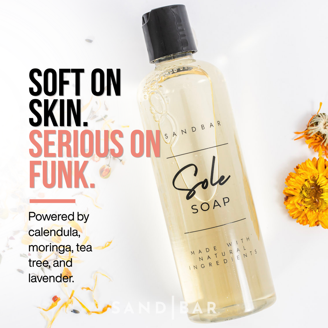 Natural foot cleanser with tea tree, lavender, moringa, and calendula for foot odor and dry skin care.